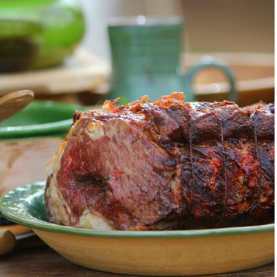 a venison roast in a dish.